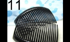 11 Black plastics comb (around 8.5cm x 5cm)